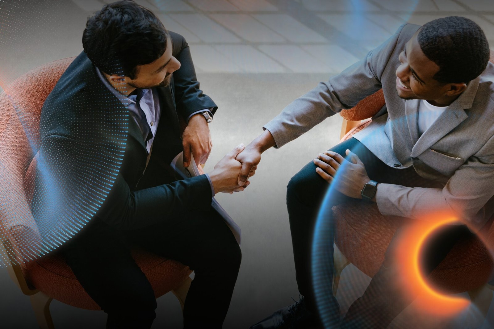 Business people greeting by shaking their hands