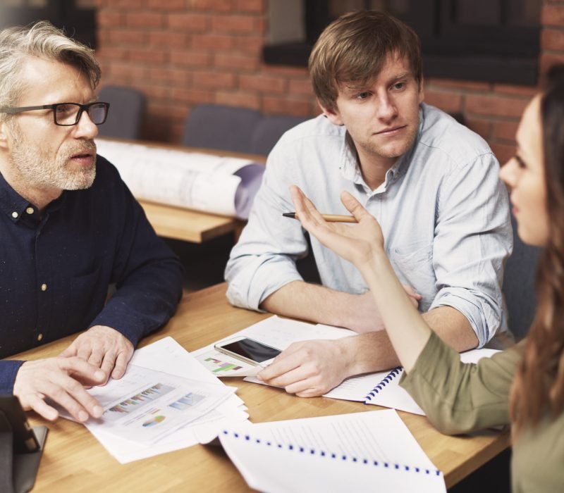 Business people talking about working