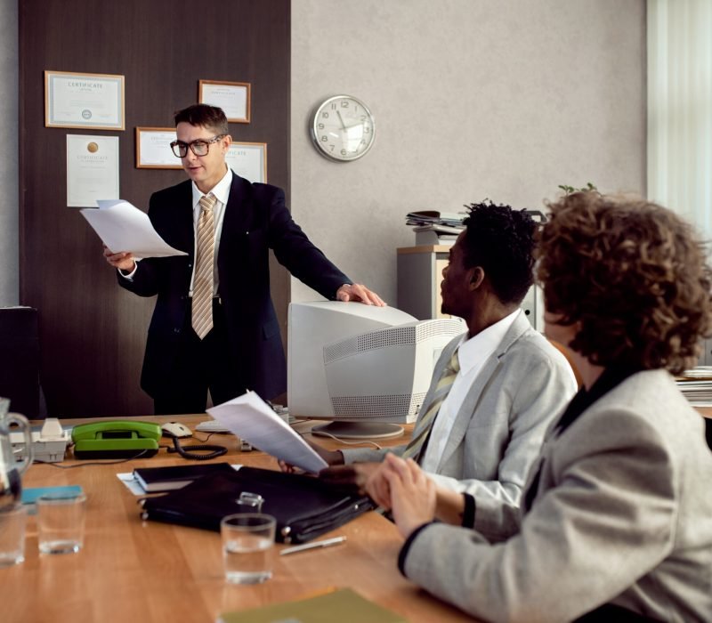 vintage-style-people-working-office-with-computers